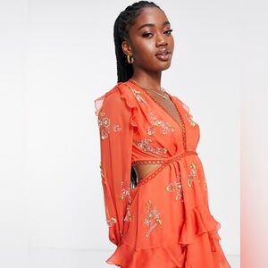 ASOS DESIGN circle trim mini dress with floral embellishment in red